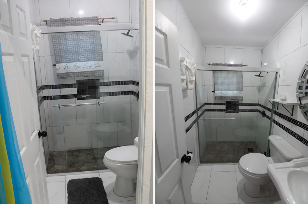 Serenity Hideaway bathroom with glass shower, toilet, and modern tile design