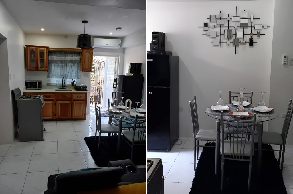 Dining table and living room area with modern decor inside Serenity Hideaway apartment