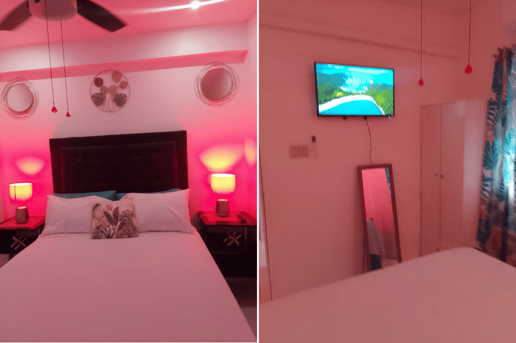 Serenity Dream bedroom with pink LED lighting, modern decor, wall art, and a mounted flat-screen TV