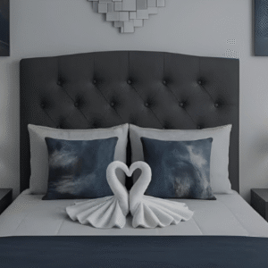 Beautiful Serenity View bedroom featuring swan towel décor on a modern tufted bed